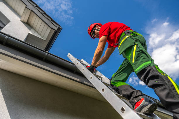 Roofing contractor working on gutters