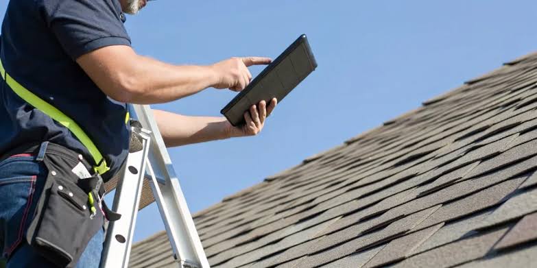 Professional roof inspection at Fort Collins, CO residential home
